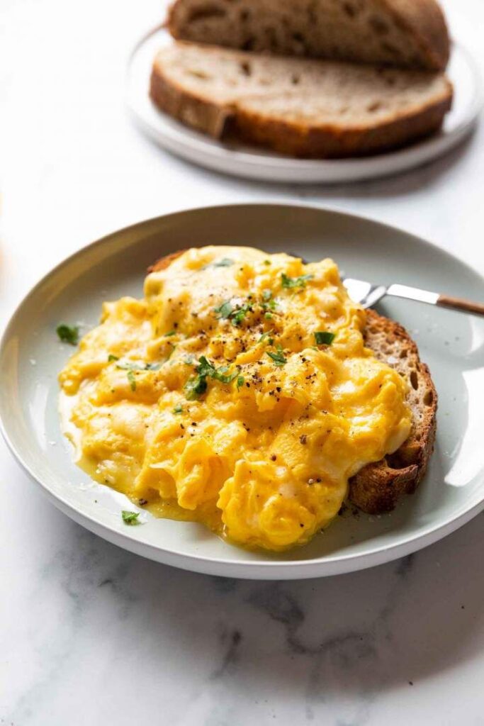 cheesy eggs on toast for breakfast